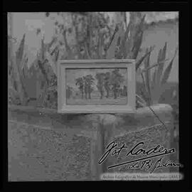 Reproducción fotográfica de una pintura de árboles.