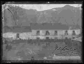 Reproducción de una pintura de un pueblo.